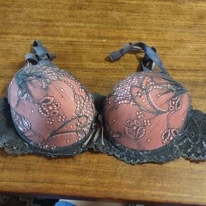 34/A , pink and grey bra